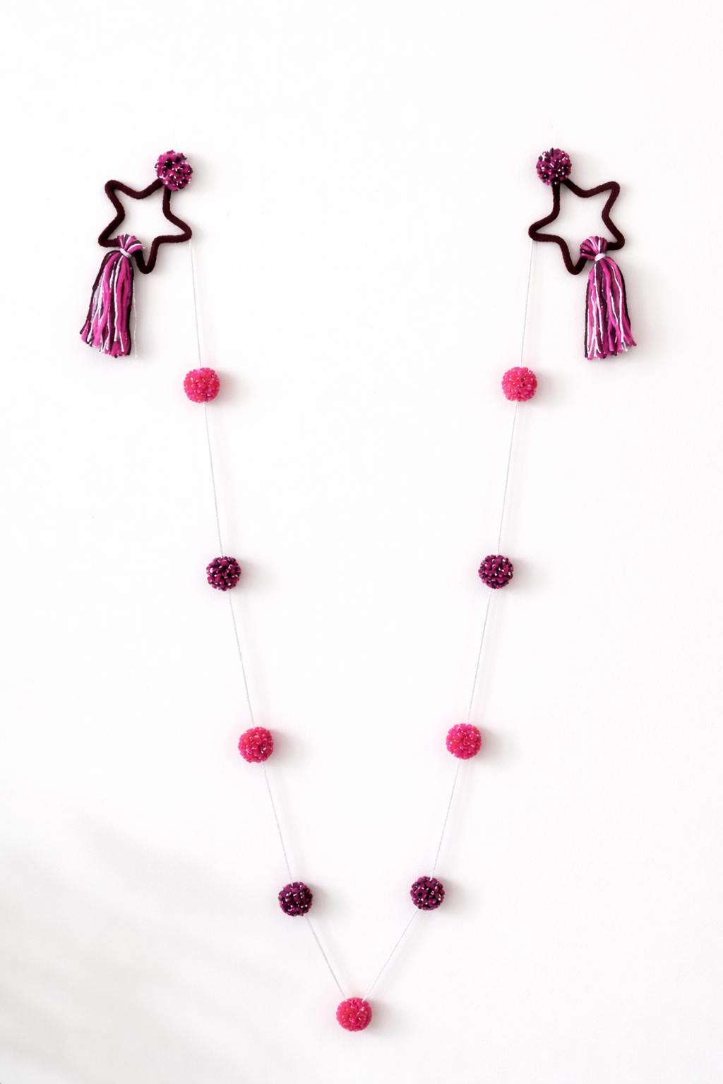 Sterren en pompon slinger - Pinknova